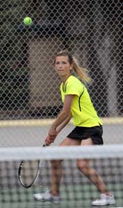 Stevensville’s Fran Farr keeps her eye on the ball during her match against Anaconda’s Ellie Krueger. Blake Hempstead photo.