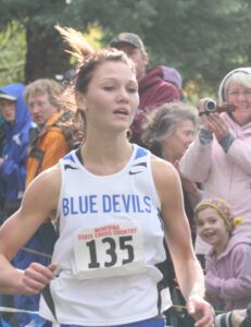 Sophomore Sadi Henderson heads for the finish line at the Montana State Cross Country championships. Jean Schurman photo
