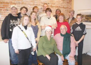 The entire Bitterroot Star crew. Back row, l to r: Randy Cook, Hamilton downtown business delivery; Robby Huhn, circulation crew supervisor; Ryan Frederickson, circulation crew; Nick Mathews, circulation crew and Stevensville and Hamilton residential delivery; Dusty Schurman, valleywide newsstand delivery; Paul Brush, Stevensville residential delivery; middle row, l to r: Serica Lucas, Hamilton residential delivery; Cara Ayres, sales consultant; Mike Huhn, circulation crew; Jean Schurman, sports editor and sales consultant; Kris Prather, circulation crew; seated: Victoria and Michael Howell, owners/publishers. We all look forward to serving you in 2012. Susanne Meikle photo.