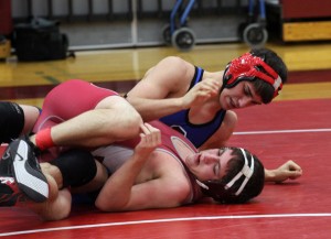 Corvallis’ Caleb Caicedo gets ready to make his next move against Hamilton’s Austin Gasdwint at the Hamilton mixer on Thursday. Caicedo won with a pin at the 1:25 mark. Jean Schurman photo